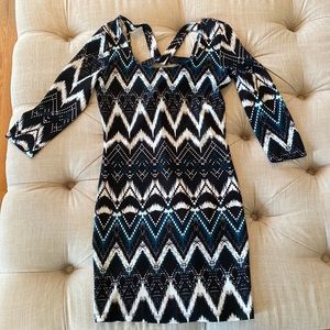 Womens dress size medium. Black, white, and turquoise. Like new, smoke free home